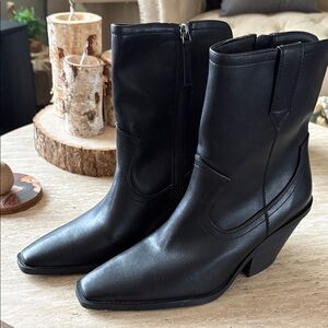 Sleek Black Leather Heeled Boots